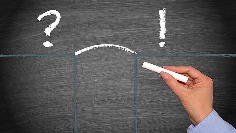 chalkboard drawing bridging a gap